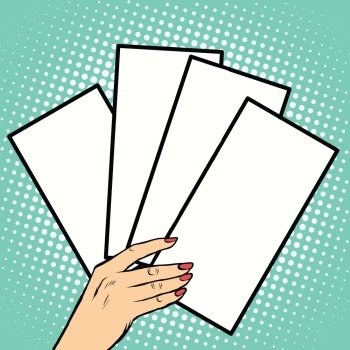 Booklets or tickets in hand pop art retro vector. Business concept pure white forms. Booklets or tickets in hand