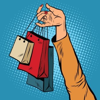 Sale, bags packages in the hands of women, pop art retro vector. Black Friday and holiday sales. A customer in the store