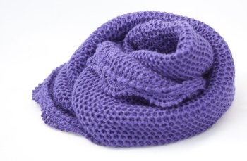 Beautiful knitted scarf (snug) on white background
