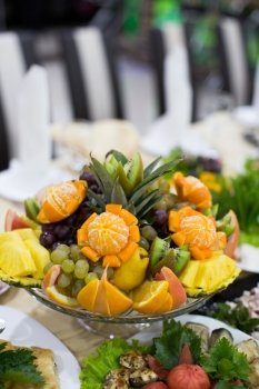 Pineapple, Kiwi And Different Fruits And Berries.