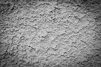 Cement wall background and texture with vignetting and blank copyspace for text or advertising.