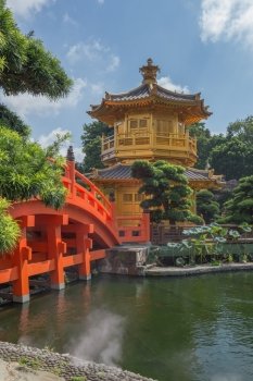 golden teak wood pagoda at Nan Lian Garden in Hong Kong, China