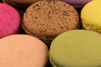 Tasty colorful macaroon close up for background