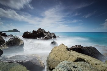 Long Exposure by the Rocks next to the sea in Saint Lucia