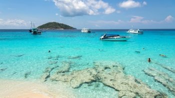 Beautiful landscapes of sky over the sea and tourists on beach in the summer at Koh Miang island is a attractions famous for diving in Mu Ko Similan National Park, Phang Nga Province, Thailand