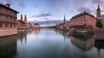 ZURICH, SWITZELAND - 04 June, 2016: Zurich Skyline and Limmat River. The river commences at the outfall of Lake Zurich, in the centre of the city of Zurich.
