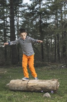 Child play in the forest. 