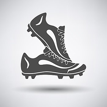 Soccer pair of boots  icon on gray background with round shadow. Vector illustration.. Soccer pair of boots 