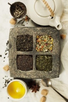 Assortment of dry tea. Tea composition with different kind of tea. Tea concept.