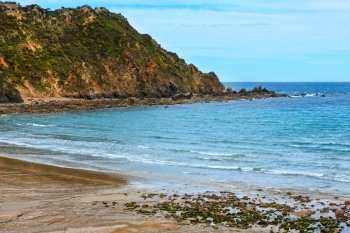 Sandy Cadavedo beach. Summer Atlantic ocean coast, Asturias, Spain.