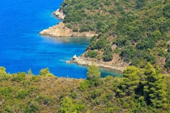 Aegean sea coast landscape with aquamarine water (Chalkidiki, Greece).