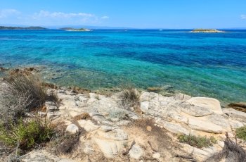Aegean sea coast landscape with transparent water, view near Karidi beach (Chalkidiki, Greece).