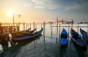Gondolas and San Giorgio Maggiore island in Venice, Italy