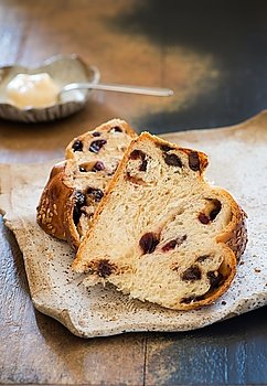 Sweet challah bread with chocolate and cranberries, slised, closeup