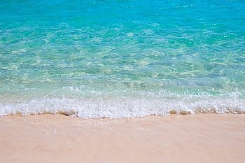 Tropical sand beach and blue sea wave. Sand beach and blue sea wave