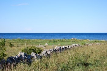 Old traditional stone wall at the swedish island Oland by the coast of the Baltic Sea