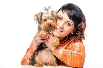 portrait of a girl in the studio with Yorkshire Terrier