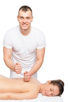 Happy massage therapist and the patient relax on a massage table