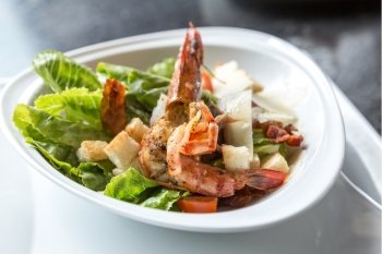 Grilled tiger prawn salad with bread