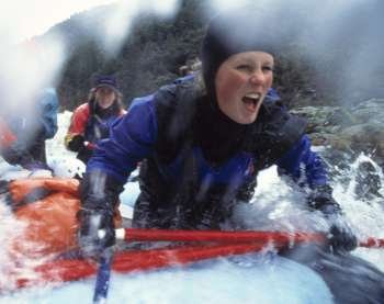 Close-up of a young woman rafting