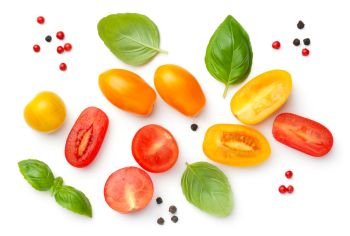 Cherry tomatoes composition with basil and peppercorns isolated on white background. Red and yellow tomato. Top view, flat lay