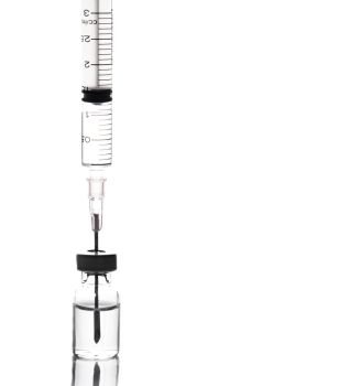 Syringe and vaccine isolated 