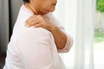 neck and shoulder pain, old woman suffering from neck and shoulder injury, health problem concept