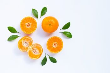 Fresh mandarin orange with leaves on white background. Juicy and sweet and renowned for its concentration of vitamin C