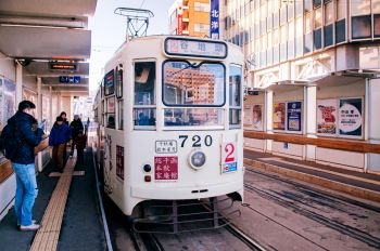 DEC 2, 2018 Hakodate, JAPAN - Hakodate city tram vintage streetcar at station near JR train station. The Tram well-established network throughout the city, and are main transportation for sightseeing.