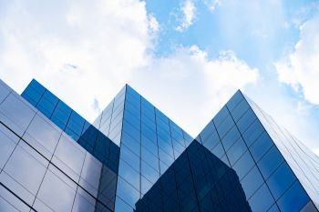 Modern buildings with blue sky and cloud in sunny day.