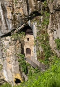 Famous castle of Predjama built into a cave in mountain in Slovenia. Predjama castle built into a cave in Slovenia