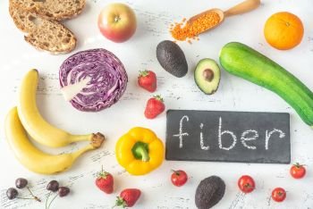 Foods rich in fiber on the white  background: top view