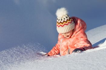 little Norwegian girl smiling. Fun winter. Norway
