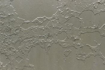 Old grey metallic background with peeling and cracked paint. Seamless texture.