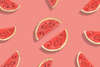 Flat lay of watermelon half slices on pink background. Watermelon pattern. Summer fruit. Creative Minimal summer pop art concept.. Flat lay of watermelon half slices on pink background. Watermelon pattern.