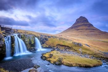 Fantastic evening with Kirkjufell volcano the coast of Snaefellsnes peninsula. Picturesque and gorgeous morning scene. Location famous place Kirkjufellsfoss waterfall, Iceland, Europe. Beauty world.