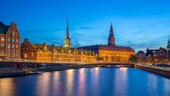 Copenhagen city at night with Christiansborg Palace in Copenhagen city, Denmark.