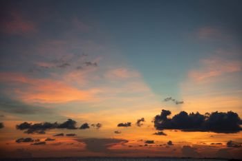 Beautiful sky sunset silhouette cloud  colorful orange and blue dramatic sky background on the tropical sea summer
