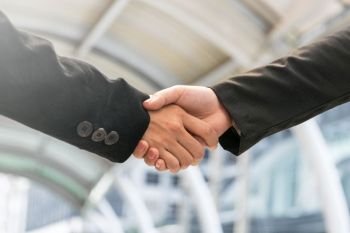 businessmen handshaking. Business partnership concept