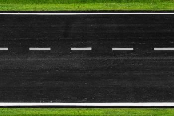 Asphalt road with marking lines white stripes texture Background