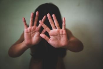 Women bondage lift hands against violence against women, international women’s day.
