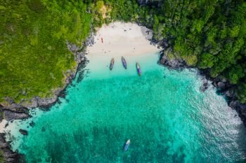 aerial view phi phi island beautiful landscape high season summer holiday  tourists thai and foreign rent a long - tail boat and speed boat snorkel under the sea phi phi island kra bi Thailand