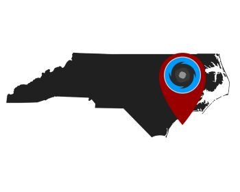 Map of North Carolina and pin with hurricane warning