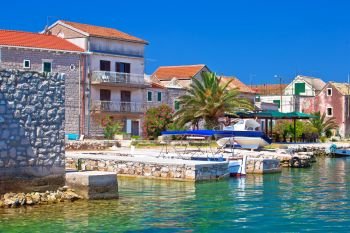 Colorful waterfront of Krapanj island village view,  sea sponge harvesting village, Sibenik archipelago of Croatia