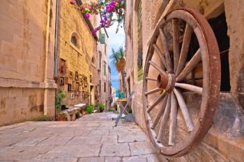 Town of Korcula steep narrow stone street colorful view, archipelago of southern Dalmatia,  Croatia