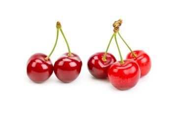 Ripe cherries isolated on white background. Healthy food.