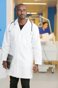 male doctor in white coat with stethoscope at hospital