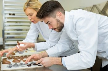 catering team working under pressure with chocolate
