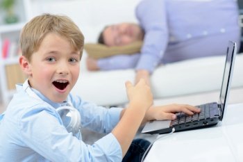 Incredulous child pointing to sleeping adult