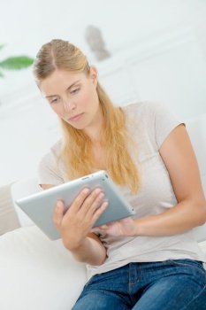 a woman working on tablet